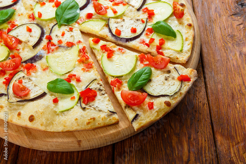 Delicious vegetarian pizza with aubergines and zucchini