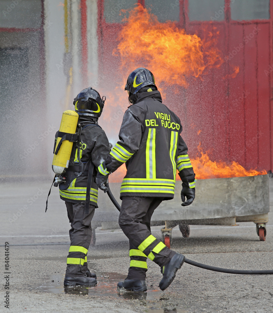firefighters with oxygen bottles off the fire firefighters with oxygen bottles off the fire