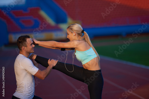 sporty woman on athletic race track