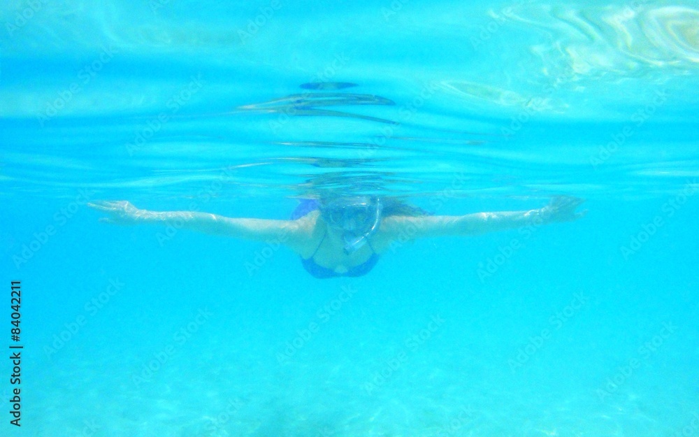 young woman snorkeling