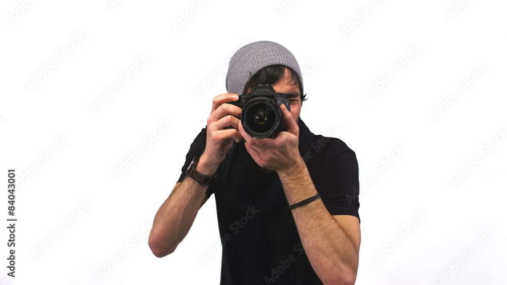 An attractive young photographer in a studio An attractive young photographer in a studio