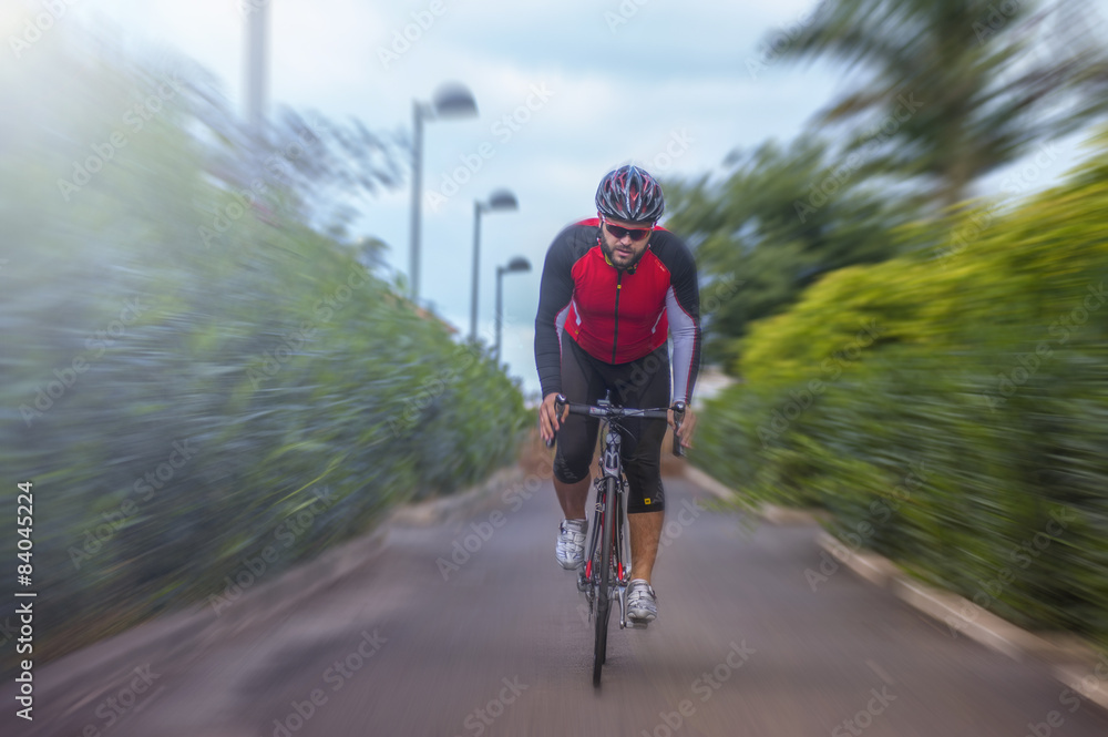Fototapeta premium Cyclist on the road