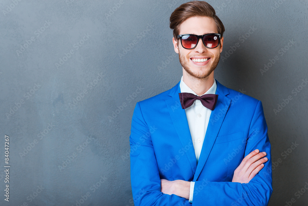 Smile is a part of his style. Smile is a part of his style.