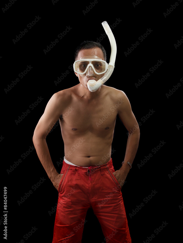 portrait face of young asian man wearing snorkel mask standing a