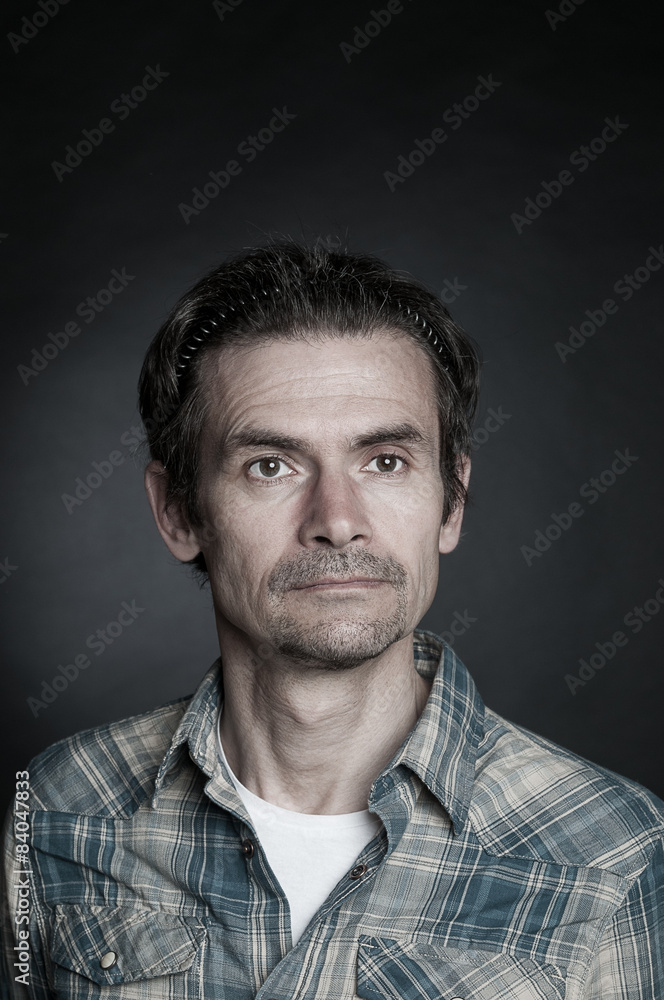 Portrait of serious adult man Portrait of serious adult man