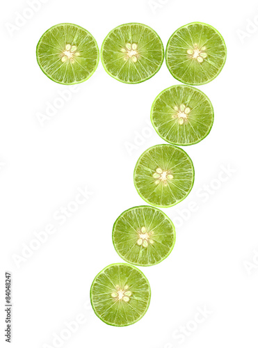 Number saven lime isolated on white background. photo