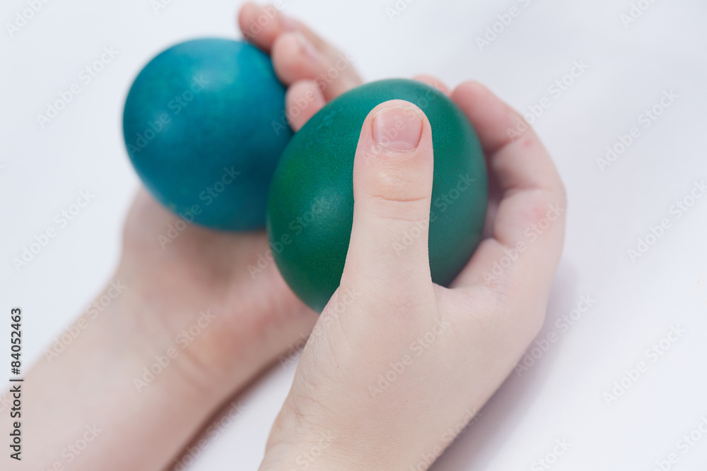 Easter eggs in the children's hands Easter eggs in the children's hands
