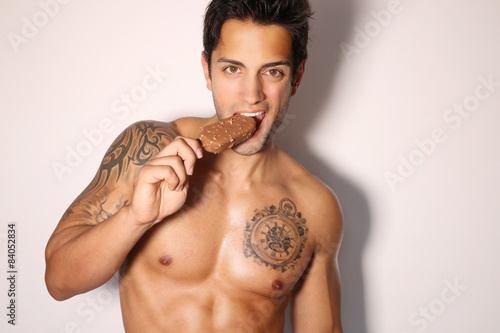sexy male eating ice cream 