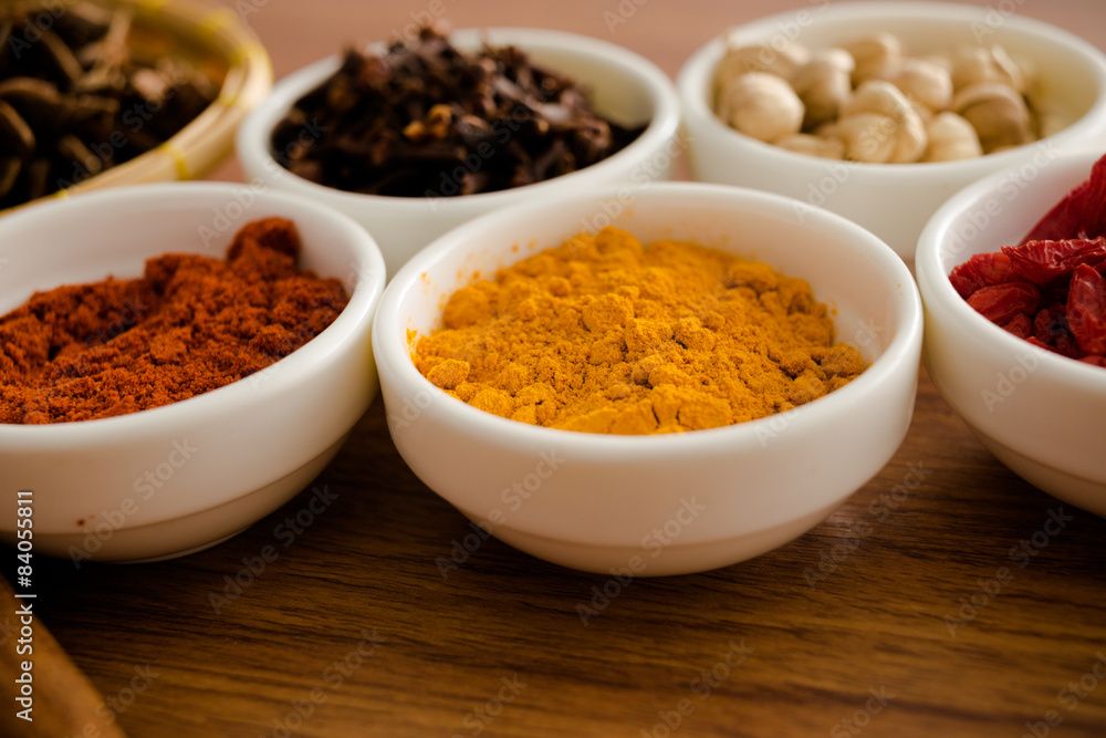 Wooden table of colorful spices Wooden table of colorful spices