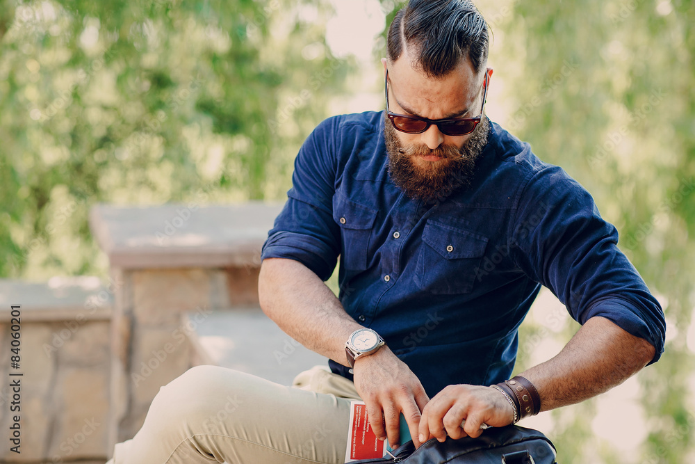 bearded man travels with map bearded man travels with map