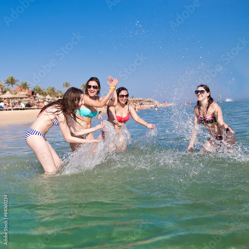 Young people having fun on the beach