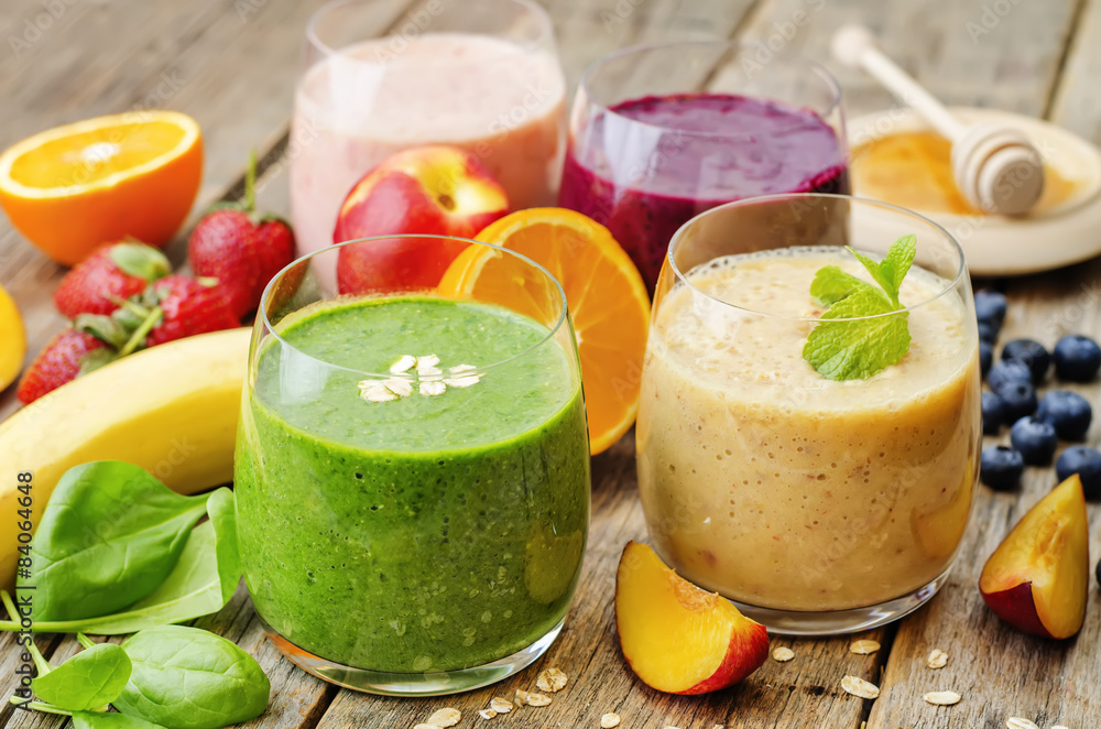 smoothie with spinach; blueberries, peach and strawberries smoothie with spinach; blueberries, peach and strawberries