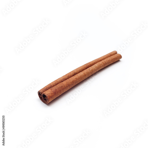 single cinnamon stick isolated on white background
