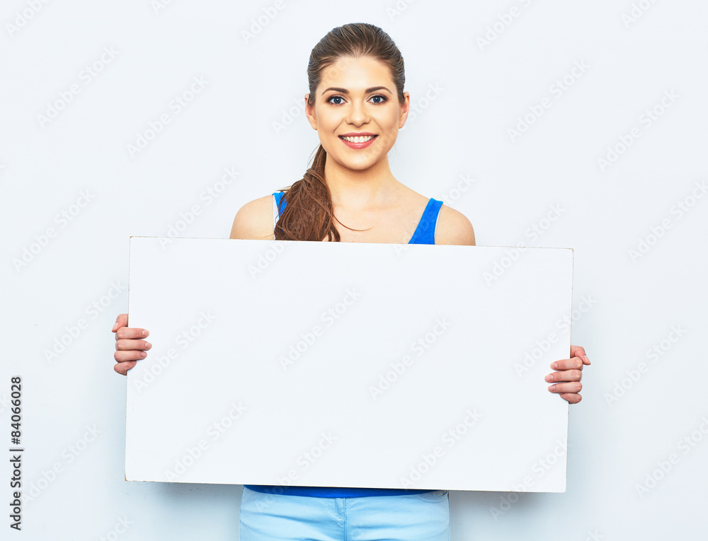 young woman holding white blank signboard. young woman holding white blank signboard.