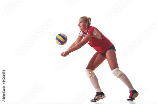 volleyball woman jump and kick ball isolated on white background © .shock