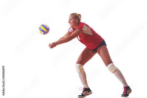 volleyball woman jump and kick ball isolated on white background