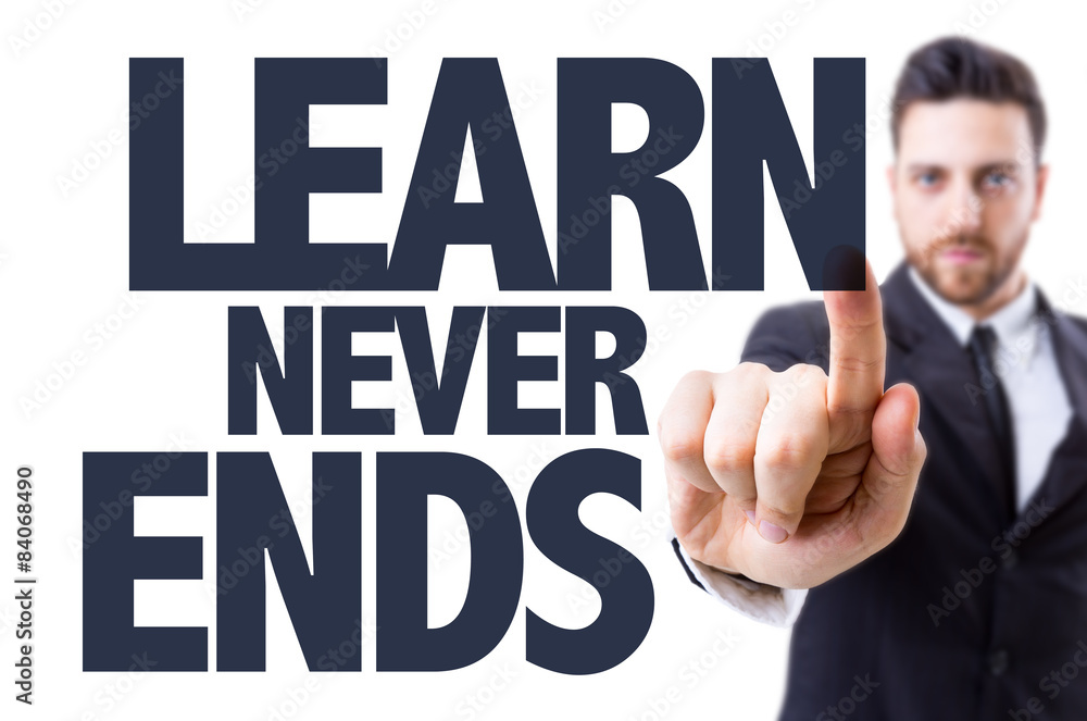 Business man pointing the text: Learn Never Ends Business man pointing the text: Learn Never Ends