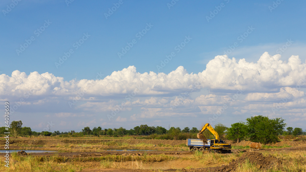 Fototapeta premium Agricultural with backhoe