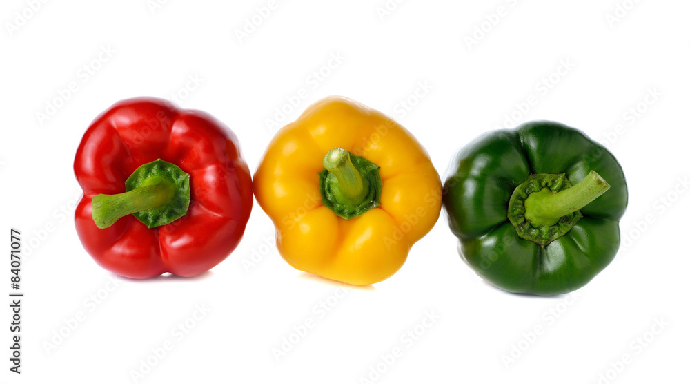 red yellow green bell pepper on white background