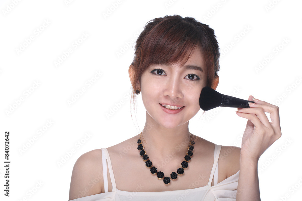 Makeup dry cosmetic tonal foundation on her face Makeup dry cosmetic tonal foundation on her face