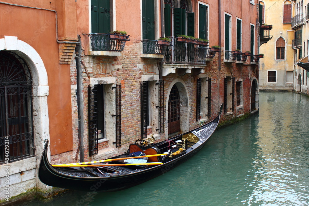 Parking gondola in narrrow canal in Venice. 