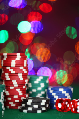 Chips for poker on shiny background