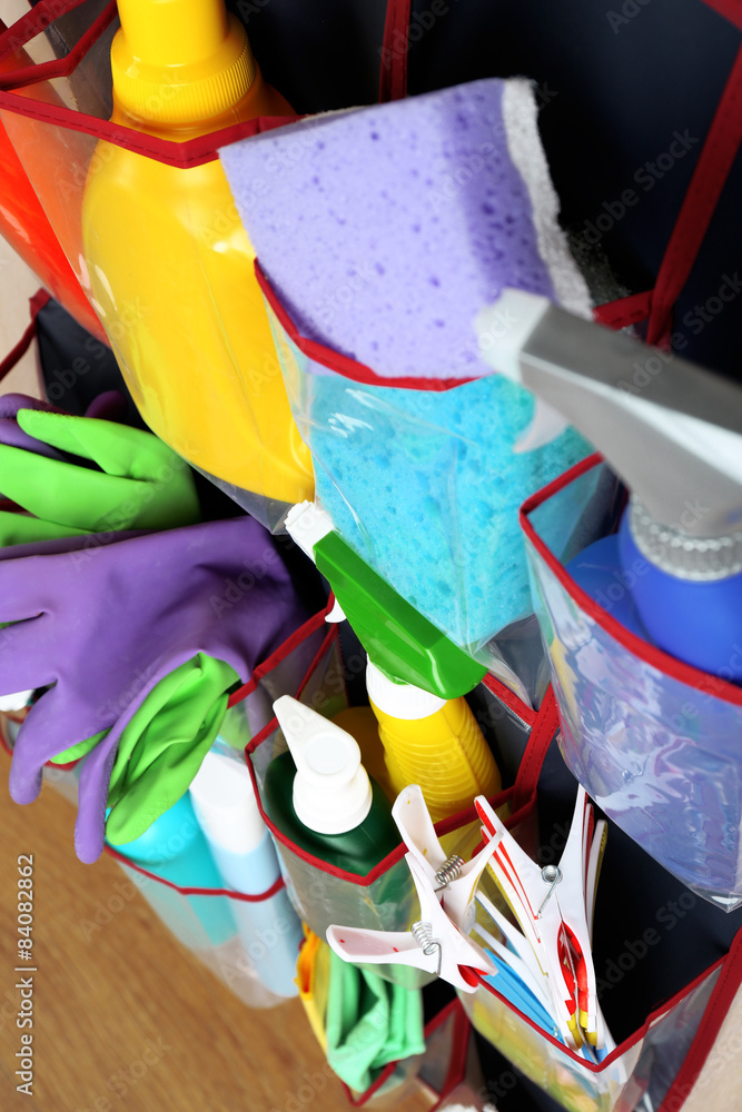 Fototapeta premium Household chemicals in holder, closeup