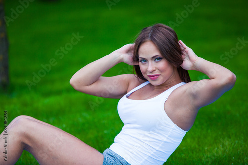 fitness and lifestyle concept - woman doing sports outdoors © satyrenko