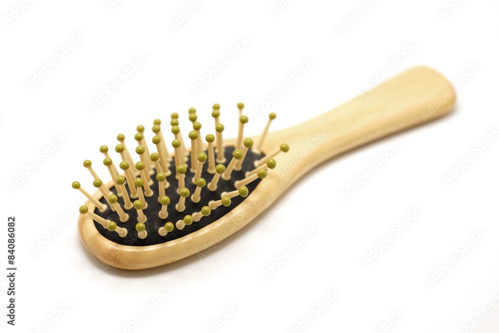 wooden comb on white background wooden comb on white background