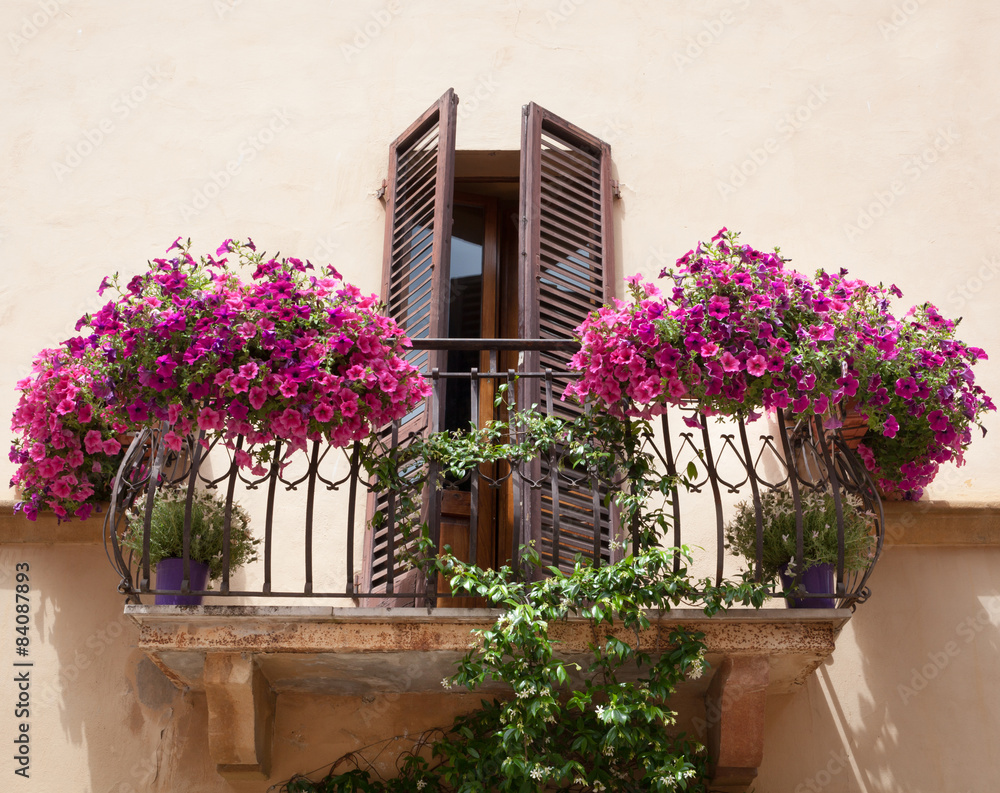 Flowers on a balcony in Pienza Tuscany Flowers on a balcony in Pienza Tuscany