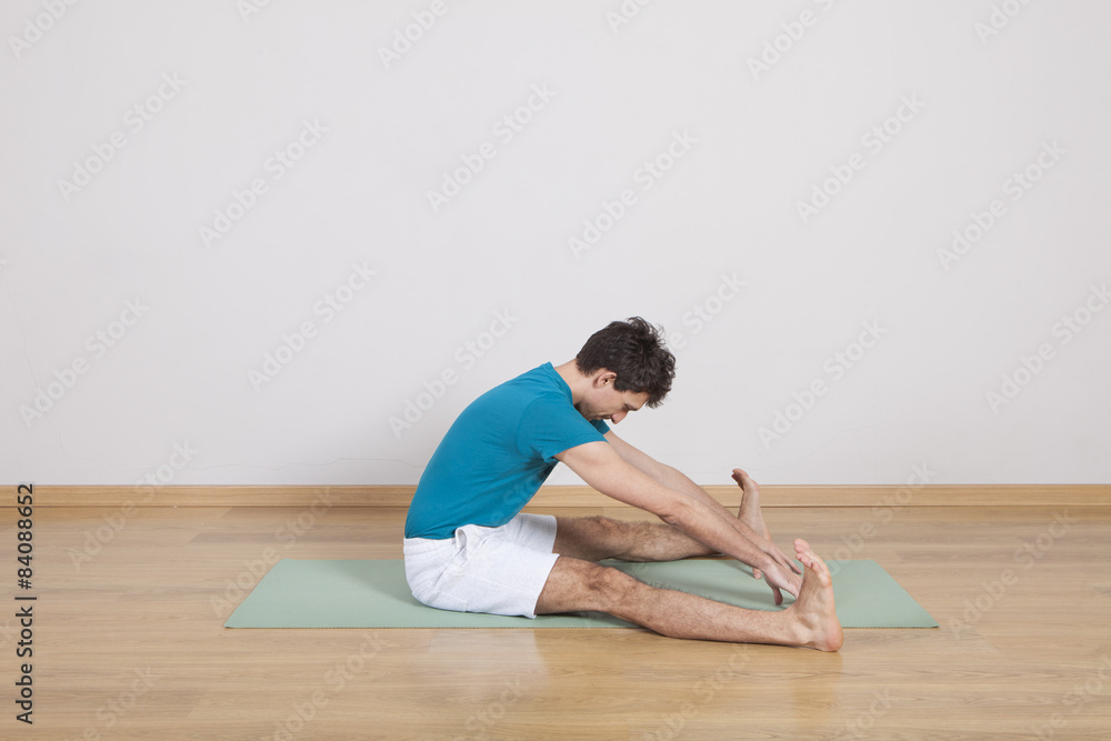 Naklejka premium man practicing pilates indoor, return to life sequence, 34 exerc