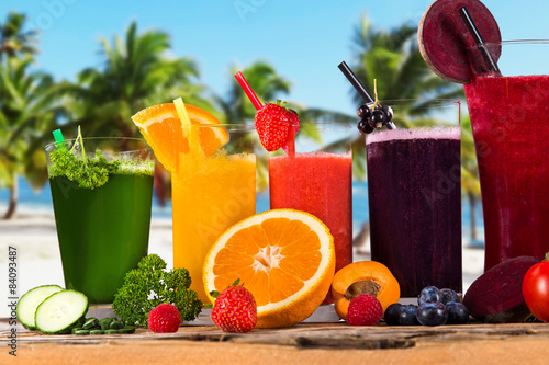 summer fruit drinks on the beach #84093487