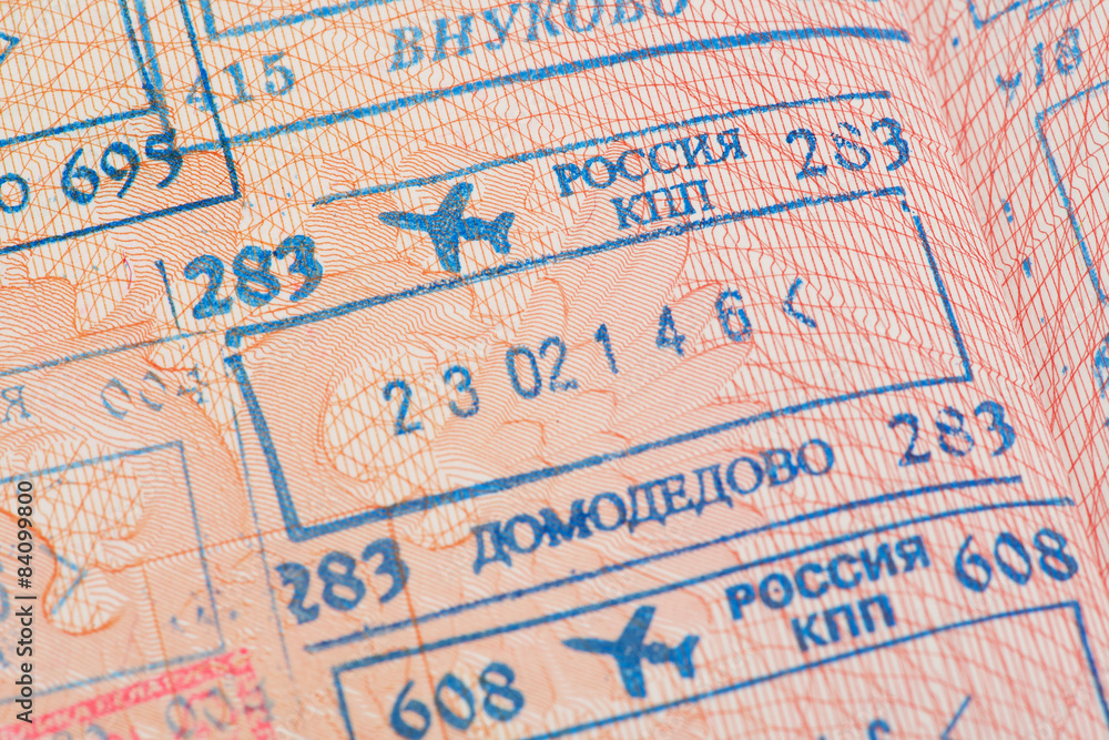 Fototapeta premium Passport page with the immigration control stamps.