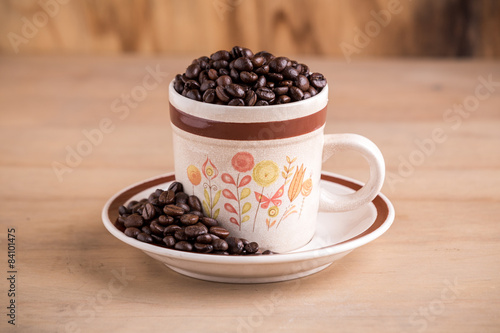 coffee cup with wooden background