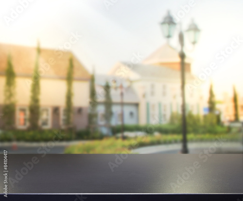 Fototapeta Naklejka Na Ścianę i Meble -  Table Top And Blur Building Background