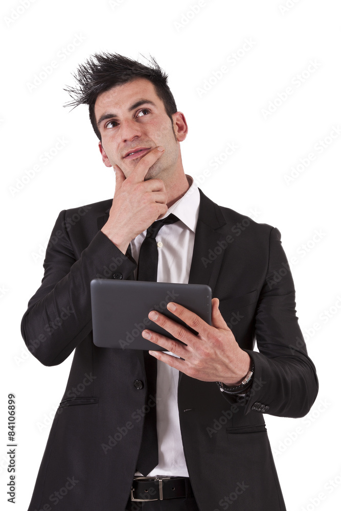 man in suit and tablet thinking man in suit and tablet thinking