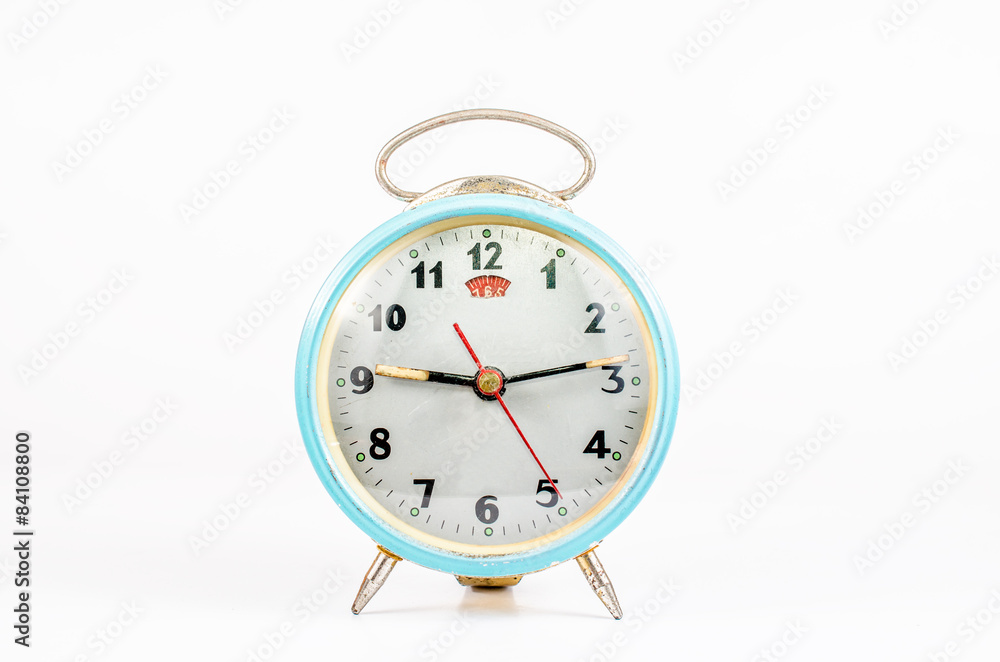 Retro alarm clock isolated on white background