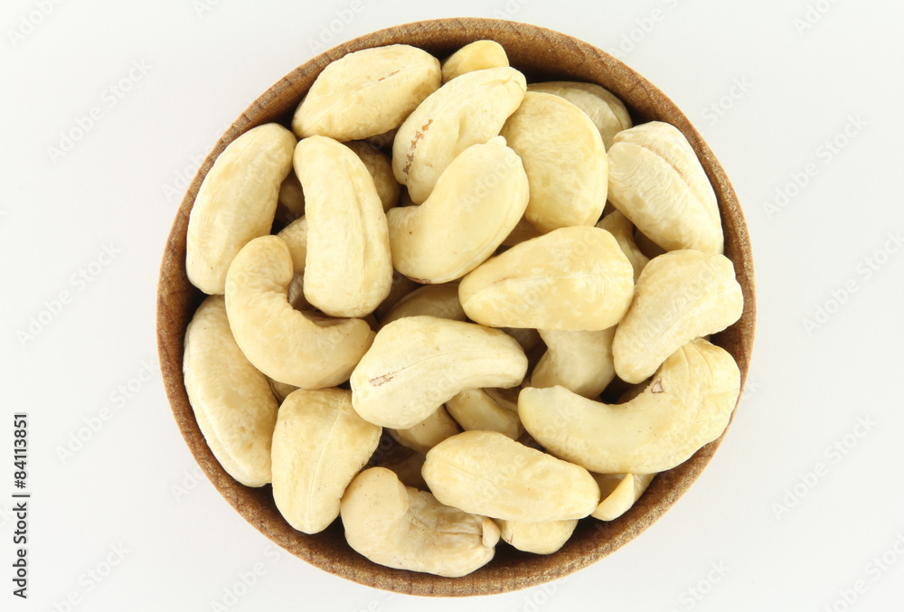 Cashew in a round wooden form Cashew in a round wooden form