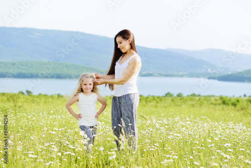 mother and daughter in field