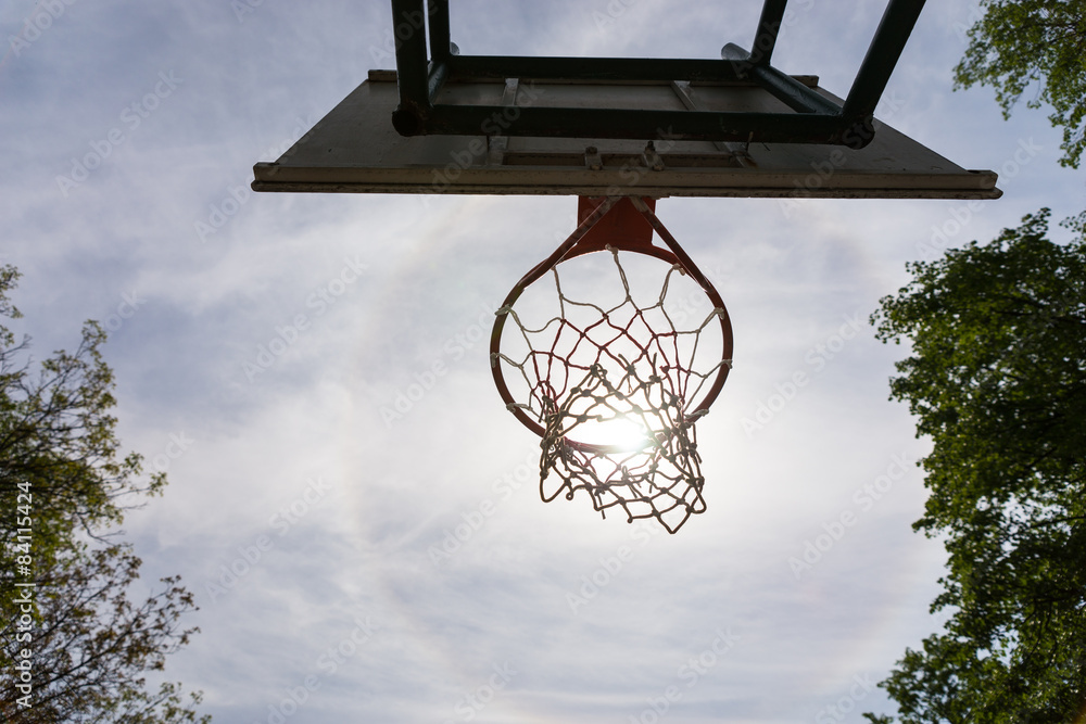 Low Angle of Basketball Net Against Sunny Blue Sky Low Angle of Basketball Net Against Sunny Blue Sky