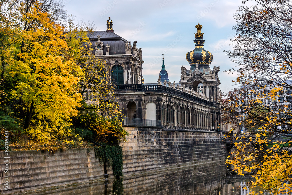 Colorful autumn view of Zwinger from channel. Dresden, Germany.