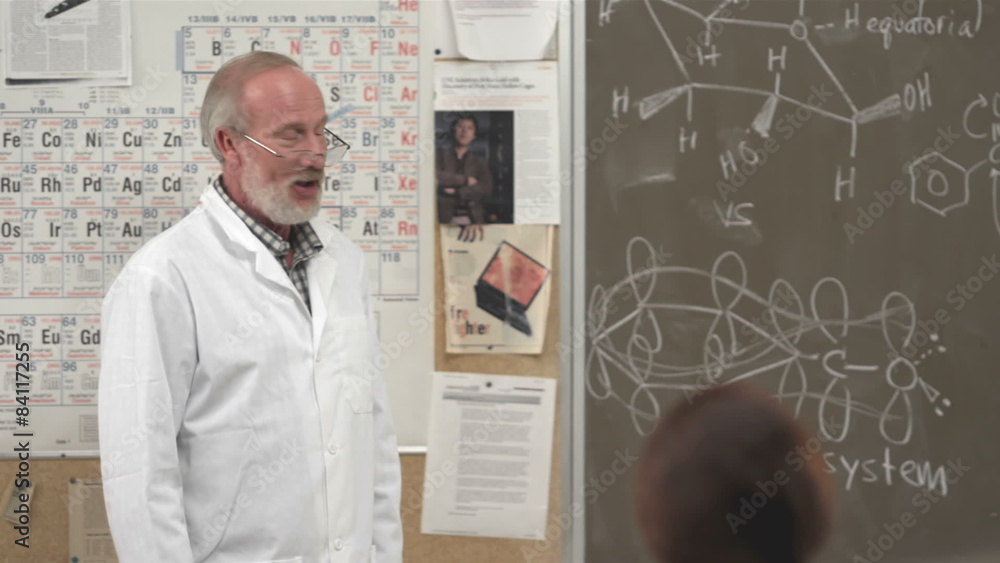 A professor gives a lecture to his class A professor gives a lecture to his class