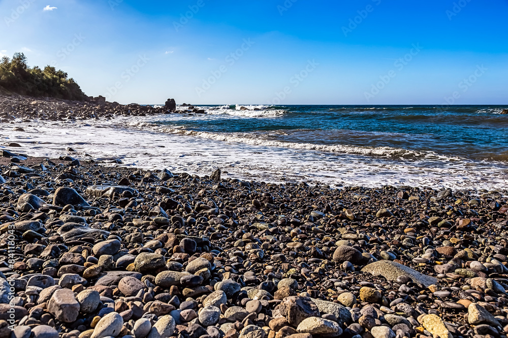 Wild stone beach on coast of ocean Wild stone beach on coast of ocean