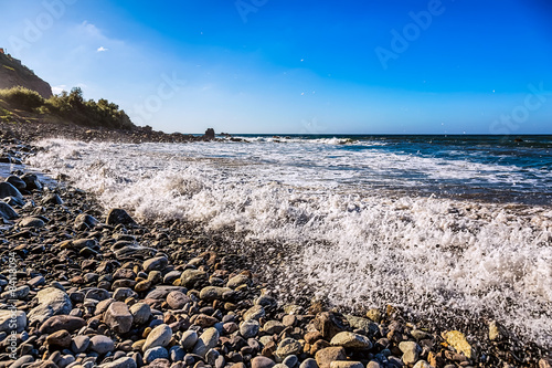 Stone beach on shore of ocean