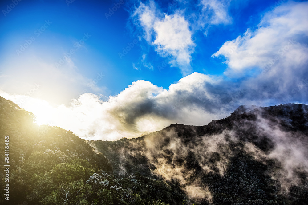 Mountains with clouds and sun with sunlight Mountains with clouds and sun with sunlight