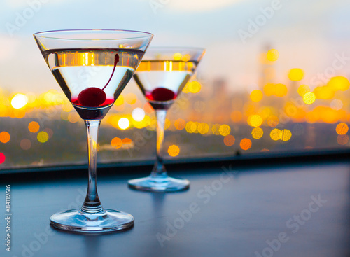 Photography Cocktail glasses with city view