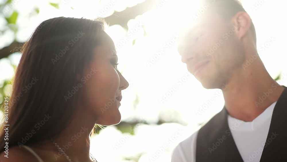 Beautiful couple lean their heads on one another. Close up shot. Beautiful couple lean their heads on one another. Close up shot.