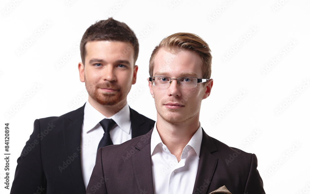 close-up portrait of two young businessmen close-up portrait of two young businessmen