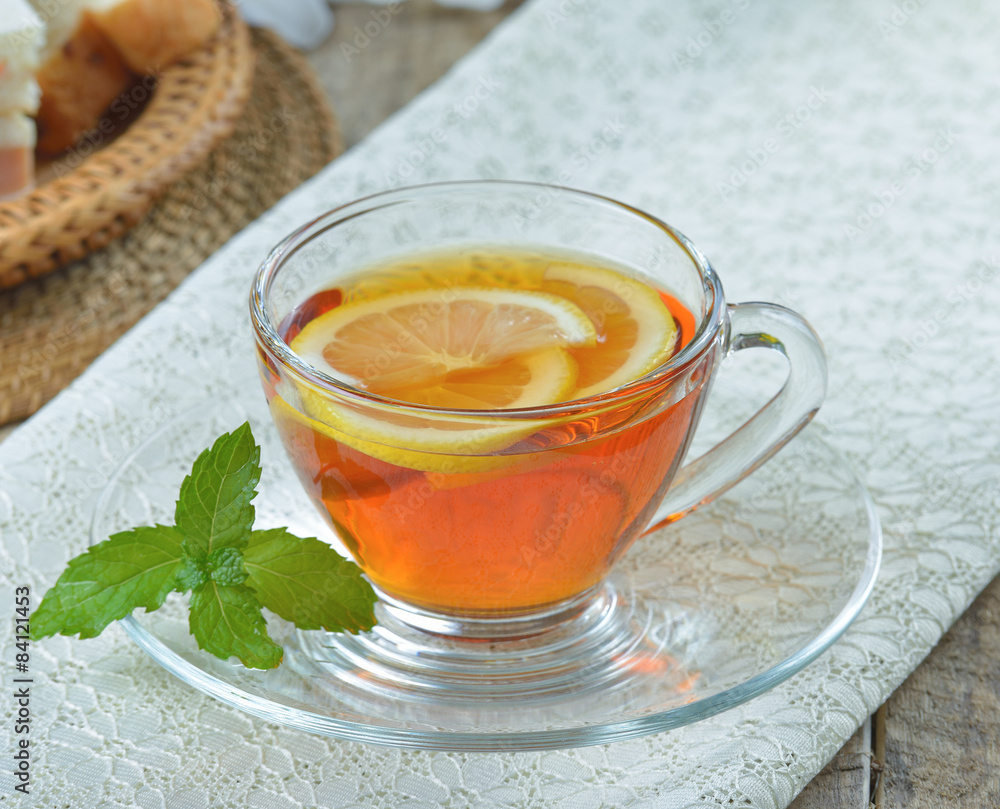cups of tea with mint on wooden table cups of tea with mint on wooden table