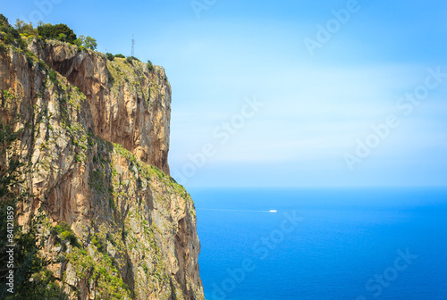Mountain with blue sea on sunny day with copy space